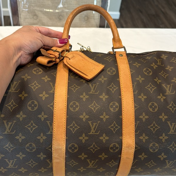 Authentic Louis Vuitton Keepal Bandolier 55 travel bag - Picture 7 of 15